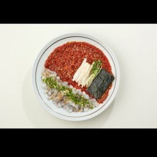 Beef tartare with chopped live small octopus