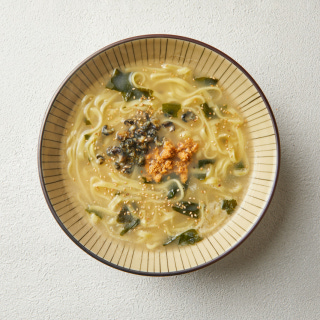 Knife-cut noodles with sea snails and sea urchin