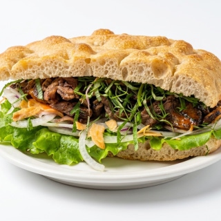 Charcoal-grilled meat stack with spicy cold noodles