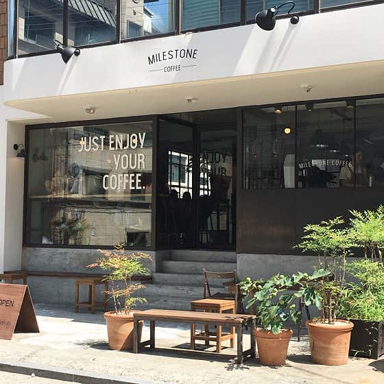 Windows and storefront at Milestone Coffee