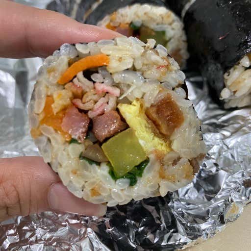 Gimbap cut to show its filling at Oneunjeong Gimbap