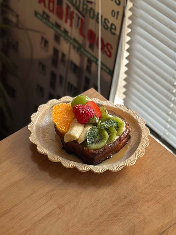 Fruit-topped dessert at Portrait Coffee Bar