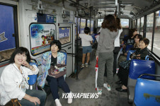 폐차 직전 `겨울연가 시내버스 인기