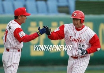 <프로야구> 이범호, 명품 3루수로 업그레이드