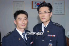 코카콜라 범인 검거특진한 경찰관