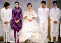 앙드레김 패션쇼 출연한 이민영과 안영학