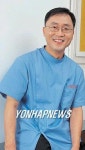  장애인 1천명 치료 치과의사