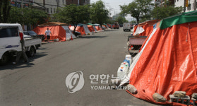 <진해 복개천 포장마차 30년만에 사라진다>