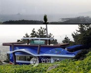 <제주 산방산 화장실에선 마라도가 보인다>