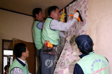 부산우체국, 도배장판 봉사활동