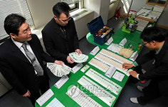 위조수표 대량유통 일당 적발