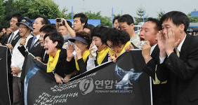 울부짖는 노사모 회원들