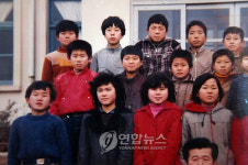 초등학교 졸업식 때의 양용은