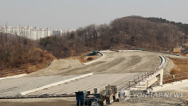 장뇌삼밭 보상 시비..광교신도시 도로개설 차질