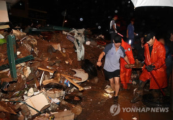 춘천 산사태 매몰..폭우 속 구조