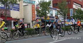 <카메라뉴스> 자전거 타고 도심을 달려요