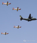 CN-235, KT-1시범비행