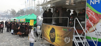 장사진 이룬 한우 직거래 장터