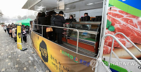장사진 이룬 한우 직거래 장터