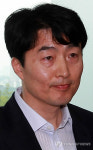 침통한 표정의 이석기