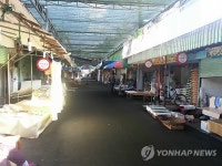 가객 김광석 덕에 재래시장 부활…상인들 울상