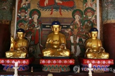 부산 장안사 석조삼세불좌상
