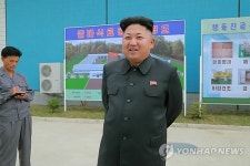 수산가공품 공장 방문한 北 김정은