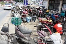 물에 잠겼던 오토바이 수리