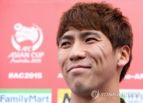 김진현의 수줍은 미소