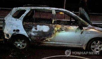 승합차 화재로 운전자 숨져