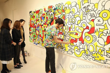 그래피티 아티스트 존 버거맨의 버거월드 전시회