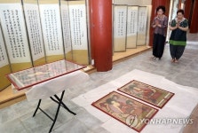 국외유출 범어사 칠성도 50여년만에 돌아왔다