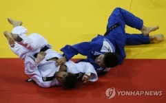 이정민, 금빛 한판