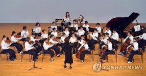아이들에게 악기를… 폐교위기서 전입희망 학교로