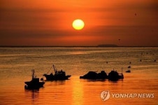 노을진 바닷가…고창서 해넘이 행사