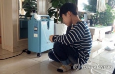 산소통에 의지한 삶