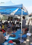 <카메라뉴스> 만학도 어르신들 폭염 속 천막수업
