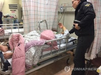 응급실서 조사받는 선장