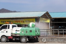 구제역 막아라 우시장 방역