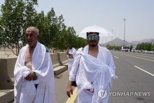 성지순례도 양산이 필수