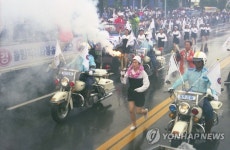 30년 만의 올림픽 성화 제주 봉송 닮은꼴, 다른점