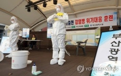 감염병 출동 보호복 제거 시연