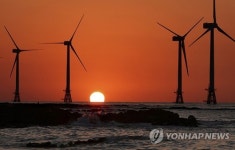 제주 신창 풍차 해변의 일몰