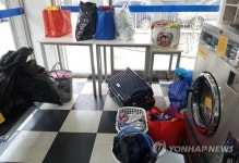 한파 지나자 동전빨래방 북새통