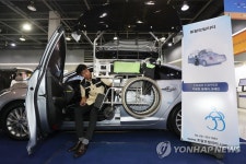 휠체어 수납 오토박스