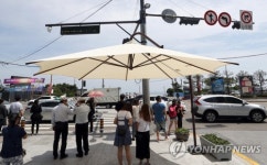 폭염속 그늘막 주문 급증…물량 부족해 지자체는 발만 동동