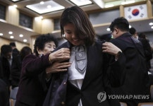 이젠 법복을 입을 시간