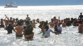 한겨울 여름풍경 서귀포 펭귄수영대회