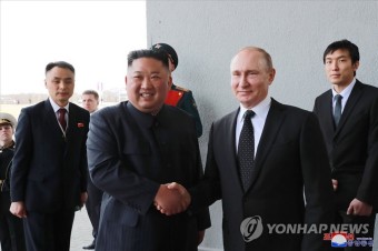김정은, 집권 후 푸틴과 첫 대면