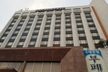 영화 친구 배경 부산 국제호텔 매각 둘러싸고 공방